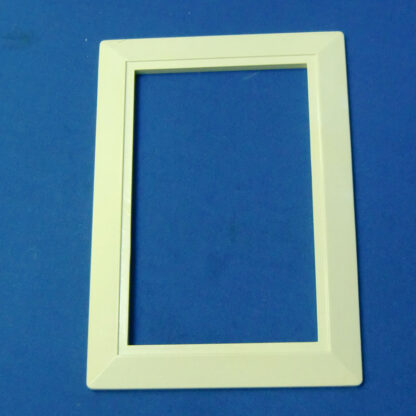 Central vacuum valve trim plate, almond